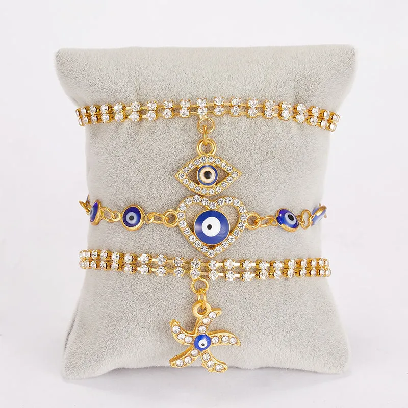 Rhinestone Bejeweled Hamsa Hands and Lucky Blue Eyes Charm Bracelets