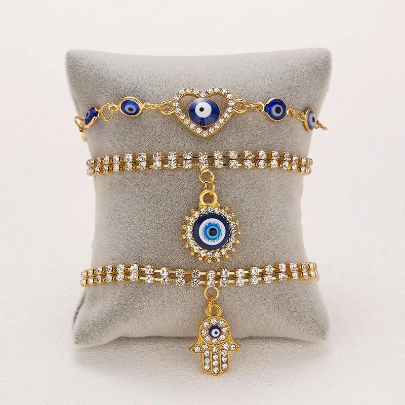Rhinestone Bejeweled Hamsa Hands and Lucky Blue Eyes Charm Bracelets